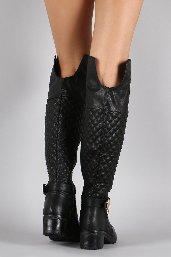 Embossed Emblem Quilted Knee High Boots