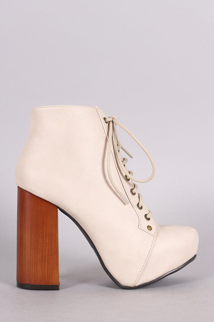 Booties with wooden heel on sale