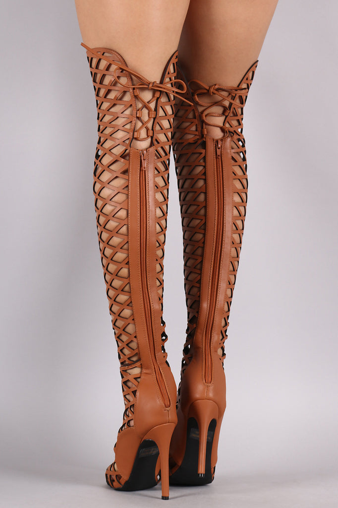 Thigh high hotsell caged boots